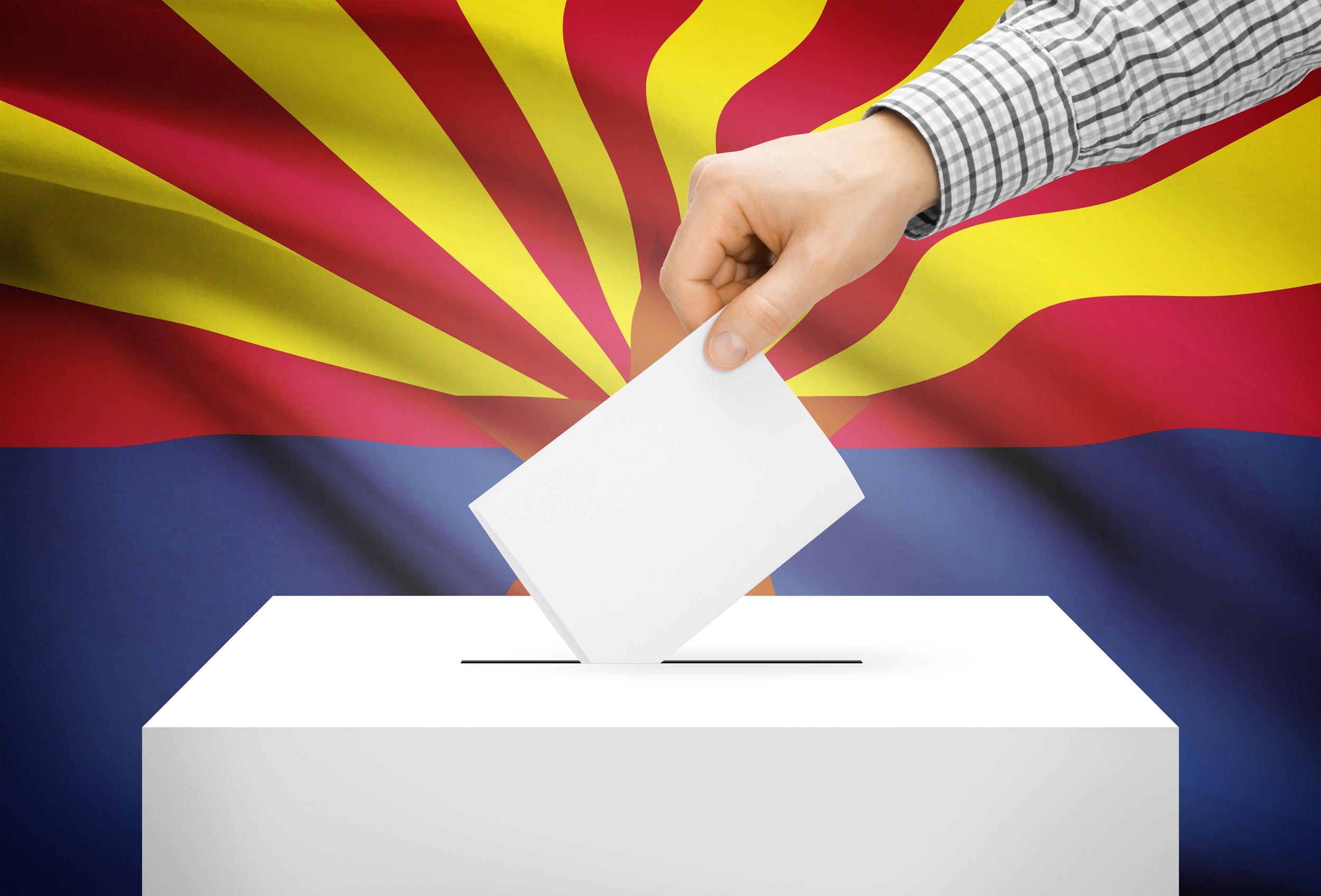 ballot box with Arizona flag in background