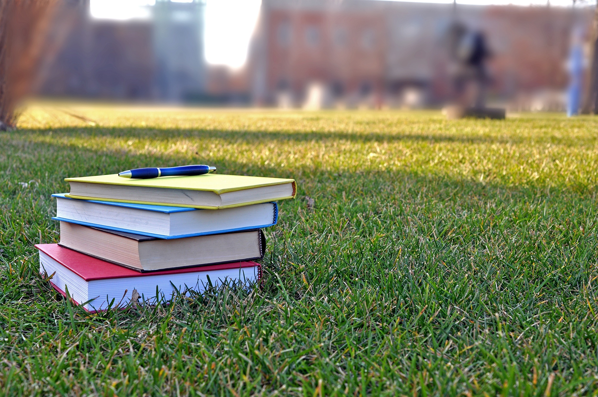 books on campus lawn